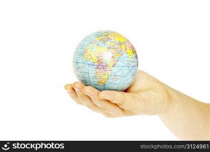 Hand holdings a globe on a white