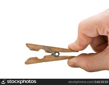 hand holds the clothespin isolated on a white background