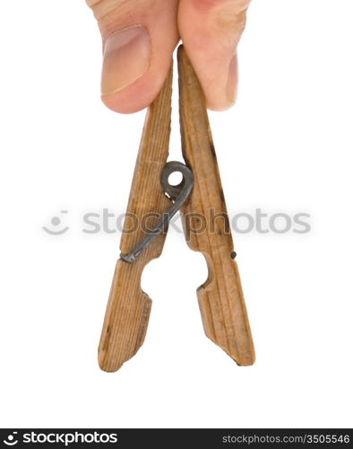 hand holds the clothespin isolated on a white background