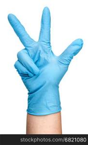 Hand in blue latex glove showing three fingers vertically isolated on white background