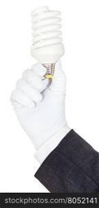 hand in business suit and textile glove holds compact fluorescent lamp isolated on white background