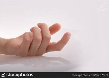 Hand loosely pointing gesture on a white background