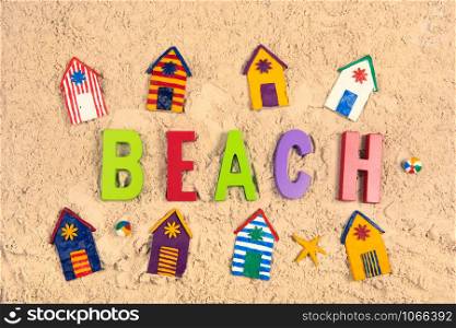 Hand made Miniature beach huts in sand