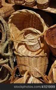 Hand made wicker baskets stacked in the shop
