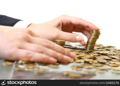 hand make coins piles on white