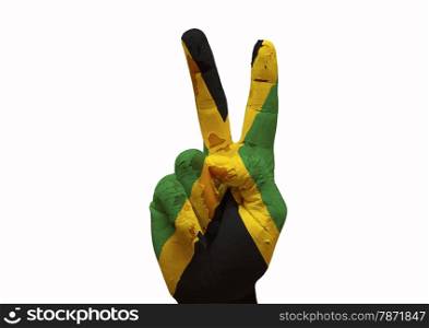 Hand making the V sign country flag painted jamaica