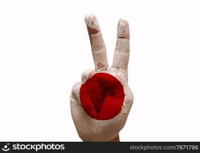 Hand making the V sign country flag painted japan