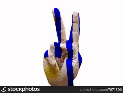 Hand making the V sign uruguay country flag painted