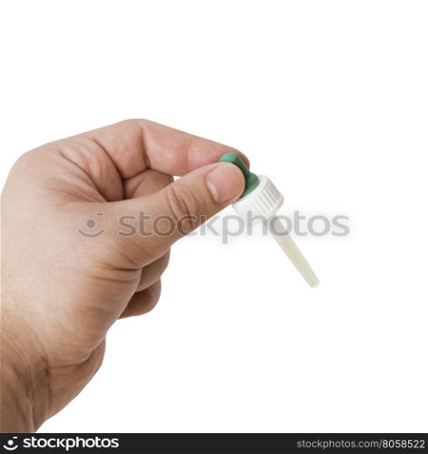 Hand man (scientist, doctor) keeps the pipette for drop, medication or chemical substance laboratory. Isolated on white background with clipping path