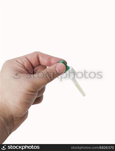 Hand man scientist, doctor keeps the pipette, medication or chemical substance laboratory. Isolated on white background with clipping path. Hand man scientist, doctor keeps the pipette