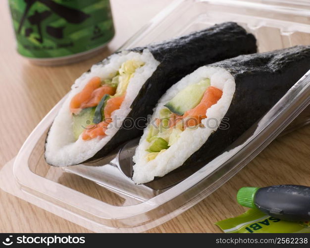 Hand Moulded Sushi With A Can Of Green Tea