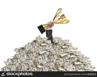 hand of a man stuck in a pile of money holding a cup trophy above the surface