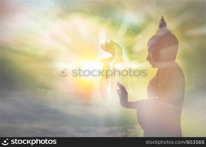 hand of buddha statue, light of wisdom and concentration concept, the belief and worship in buddhism religion