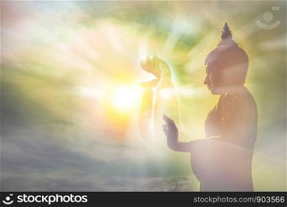 hand of buddha statue, light of wisdom and concentration concept, the belief and worship in buddhism religion