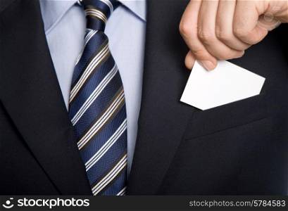 hand of business man with business card