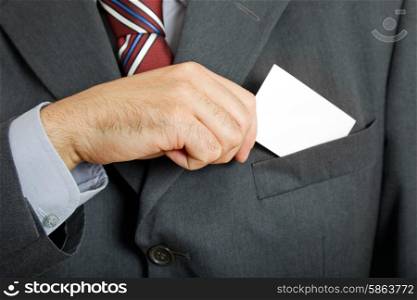 hand of business man with business card