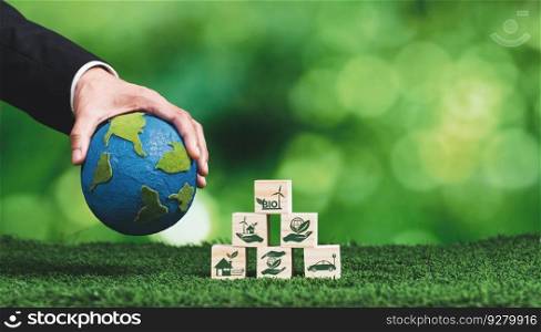 Hand of businessman holding Earth, symbolizing green business utilizing biofuel technology and environmental conservation for sustainable eco-friendly energy for clean future. Alter. Green business utilizing biofuel technology and eco conservation. Alter