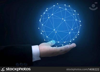 Hand of businessman holding global network connection and earth globe with points and lines.
