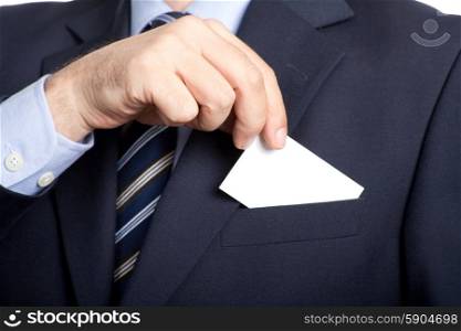 Hand of businessman offering business card, studio picture