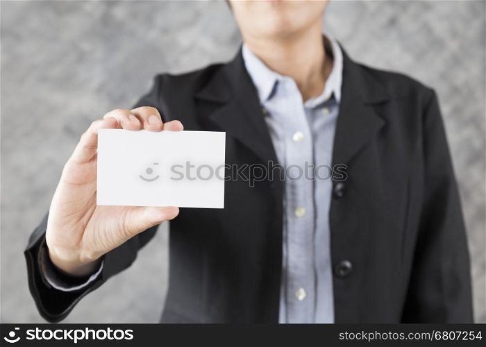 hand of businesswoman holding blank business card for adding text