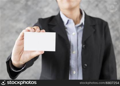 hand of businesswoman holding blank business card for adding text
