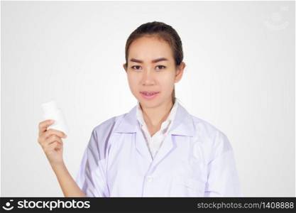 hand of doctor holding medicine bottle on white background