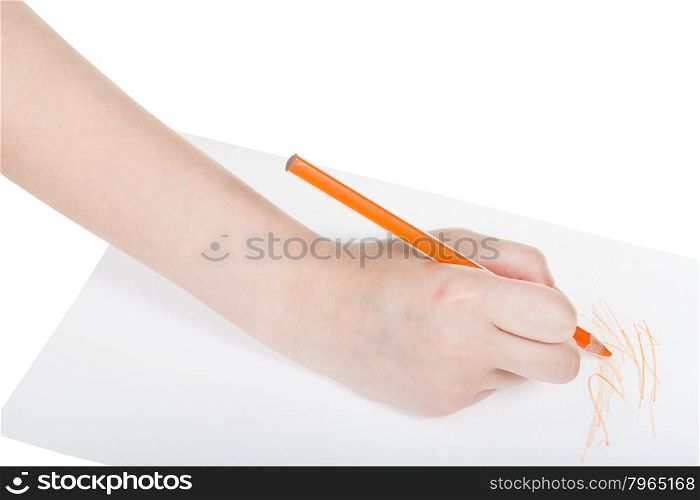 hand paints by orange pencil on sheet of paper isolated on white background