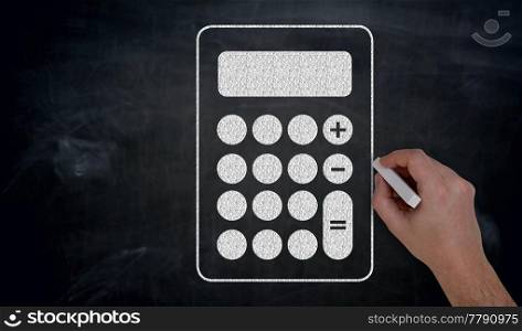 Hand paints with chalk Calculator on blackboard concept.. Hand paints with chalk Calculator on blackboard concept