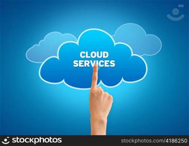 Hand pointing at a Cloud Services Cloud.