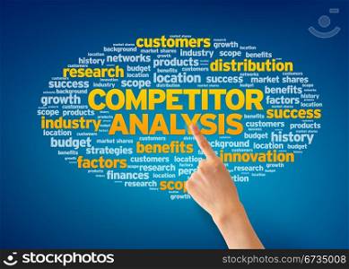 Hand pointing at a Competitor Analysis Word Cloud on blue background.