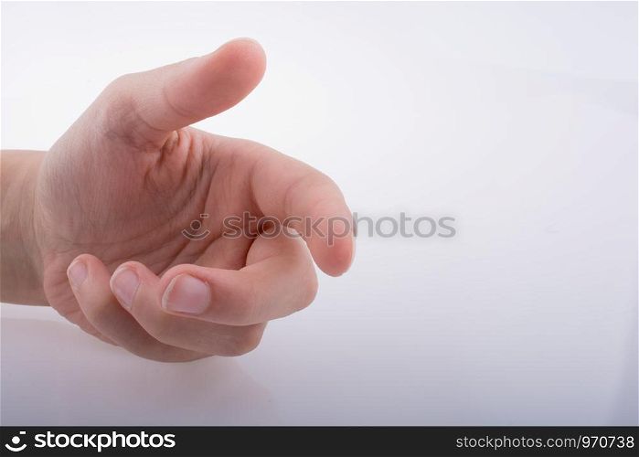Hand pointing on a white background