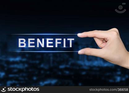 hand pushing benefit button on blurred blue background