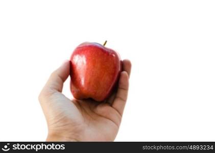 hand red apple isolated on the white.