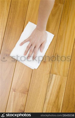 Hand seewping a floor