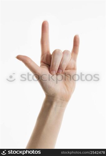 hand showing rock roll symbol