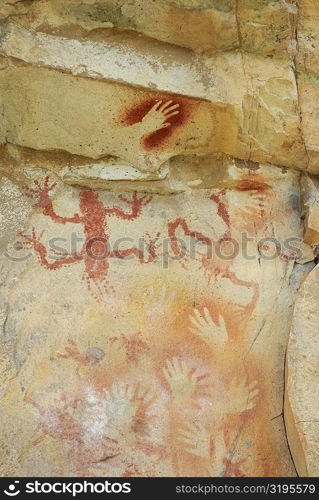 Hand signs on a rock, Cave of the Hands, Pinturas River, Patagonia, Argentina