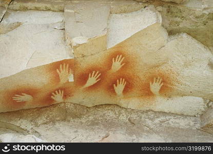 Hand signs on a rock, Cave of the Hands, Pinturas River, Patagonia, Argentina