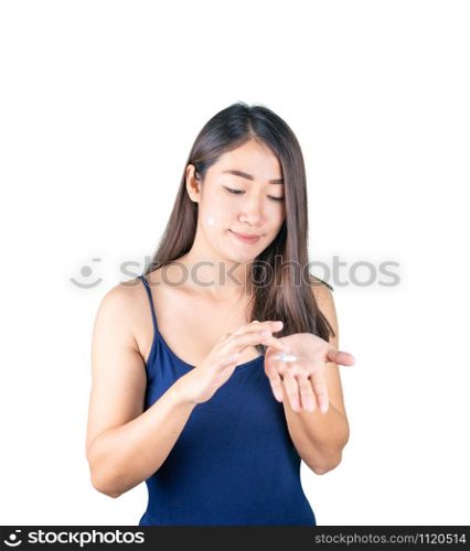 Hand Skin Care. Beautiful Asian Woman Applying Cream On Hands Skin isolated on white background with clipping path.