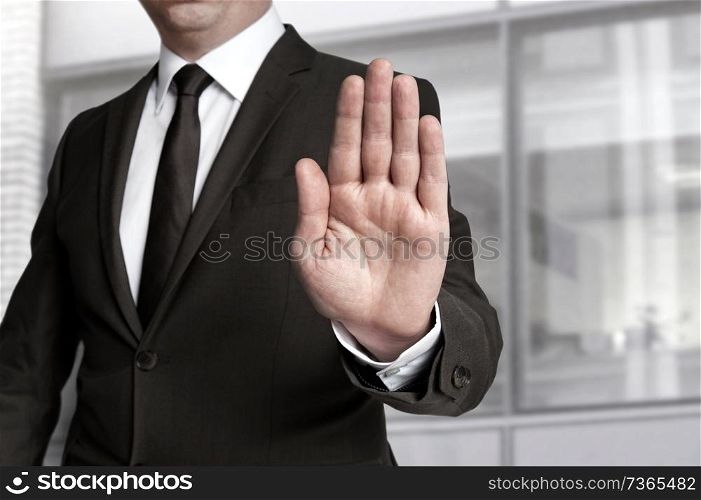 Hand stop shown by businessman.. Hand stop shown by businessman