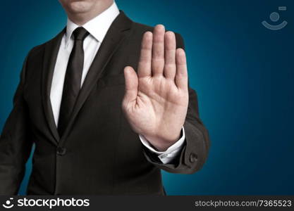 Hand stop shown by businessman.. Hand stop shown by businessman