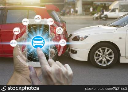 Hand use smartphone with car claim icons over the Network connection on car crash background, car accident for car insuranc claim concept.