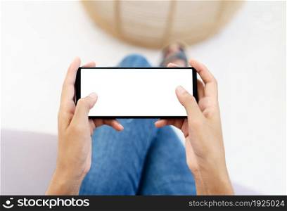 hand using cell phone in horizontal white screen display