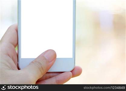 Hand using smart phone with blank screen over blur bokeh light background, template, business and technology concept, digital marketing, seo, e-commerce, lifestyle, social media network, internet of things
