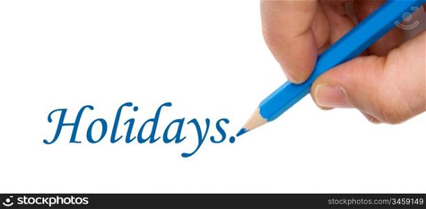 Hand with blue pen writting the word &acute;Holidays&acute;on a white background