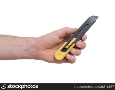 Hand with cutter isolated against a white background