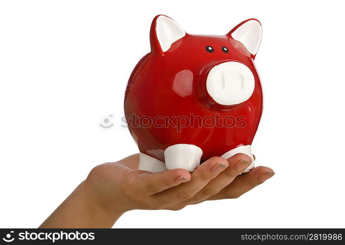 Hand with piggybank on white background