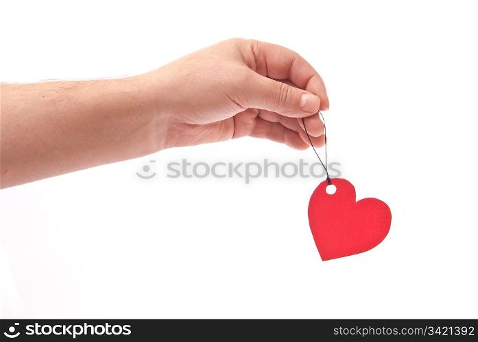 Hand with red heart tag