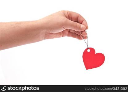 Hand with red heart tag