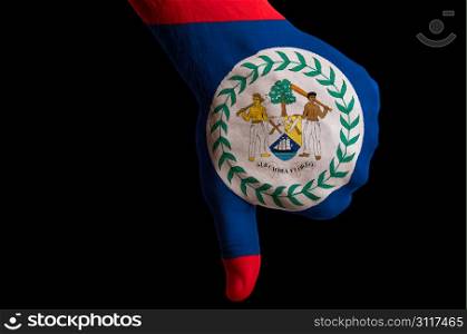 Hand with thumb down gesture in colored belize national flag as symbol of negative political, cultural, social management of country