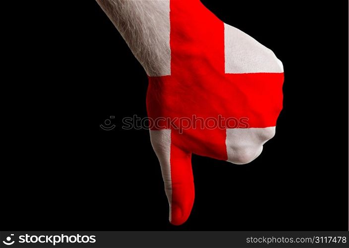 Hand with thumb down gesture in colored england national flag as symbol of negative political, cultural, social management of country